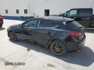 2014 Mazda 3 i Touring with VIN JM1BM1L74E1148214, listed as a Copart auction lot 54272605 with 158,278 mi miles and Salvage title. Bid and sale history available at DreamBid. Image 2.