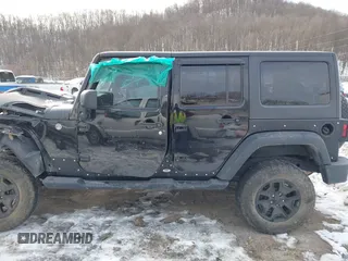 2017 Jeep Wrangler Unlimited Sport with VIN 1C4BJWDG1HL559261, listed as a IAAI auction lot 41367792 with 96,284 mi miles. Bid and sale history available at carsss.com. Image 14.