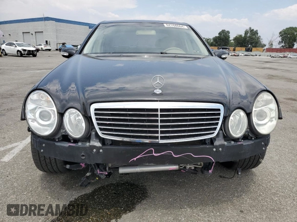2003 Mercedes-Benz E-Class 5.0L with VIN WDBUF70J53A146263, listed as a Copart auction lot 62768664 with 73,790 mi miles and Salvage Title. Bid and sale history available at carsss.com. Image 5.