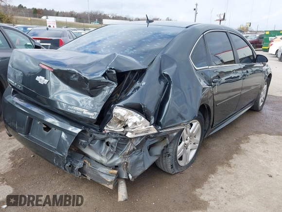 2014 Chevrolet Impala LT with VIN 2G1WB5E35E1123415, listed as a IAAI auction lot 41101111 with 129,870 mi miles and . Bid and sale history available at DreamBid. Image 4.