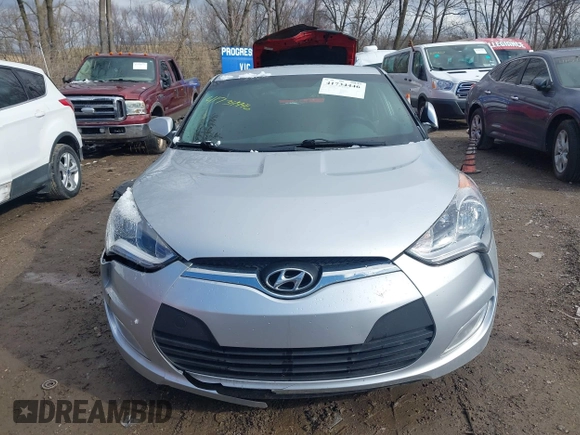 2017 Hyundai Veloster with VIN KMHTC6AD6HU310694, listed as a IAAI auction lot 41734446 with 99,432 mi miles. Bid and sale history available at carsss.com. Image 12.