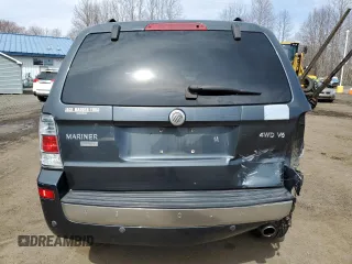 2008 Mercury Mariner Premier z VIN 4M2CU97178KJ40982, wystawiony jako Copart lot #51683375 z przebiegiem 127 132 mil mil oraz Szkody całkowita. Historia ofert i sprzedaży dostępna na DreamBid. Obrazek 6.