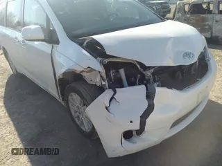 2014 Toyota Sienna XLE with VIN 5TDYK3DC3ES491381, listed as a IAAI auction lot 41803362 with 253,940 mi miles. Bid and sale history available at carsss.com. Image 6.