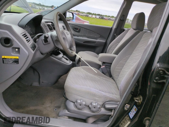 2005 Hyundai Tucson GL with VIN KM8JM12BX5U071182, listed as a Copart auction lot 74852974 with 74,235 mi miles and Salvage Title. Bid and sale history available at carsss.com. Image 7.
