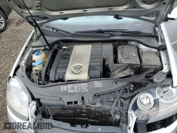 2006 Volkswagen GTI z VIN WVWFV71K36W163476, wystawiony jako Copart lot #68133394 z przebiegiem 133 733 mil mil oraz Szkoda całkowita • Salvage title. Historia ofert i sprzedaży dostępna na DreamBid. Obrazek 11.