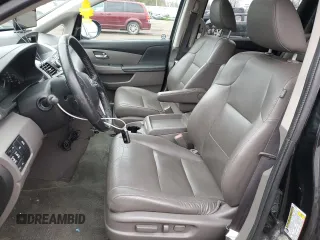 2015 Honda Odyssey Touring Elite with VIN 5FNRL5H91FB504095, listed as a Copart auction lot 53868125 with 176,272 mi miles and Salvage Title. Bid and sale history available at DreamBid. Image 7.