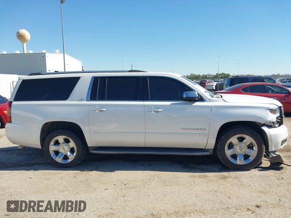 2016 Chevrolet Suburban LTZ with VIN 1GNSCJKC0GR135103, listed as a IAAI auction lot 41372158 with 167,540 mi miles and . Bid and sale history available at DreamBid. Image 13.