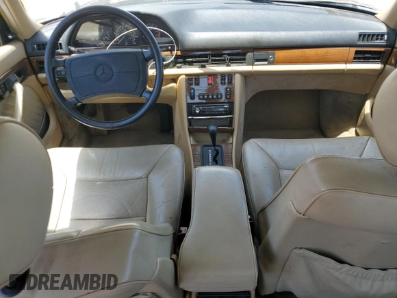 1990 Mercedes-Benz 300 with VIN WDBCA24D1LA529716, listed as a Copart auction lot 56581335 with 122,286 mi miles and Salvage Title. Bid and sale history available at DreamBid. Image 8.