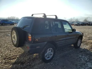 1998 Toyota RAV4 with VIN JT3HP10V6W0183708, listed as a Copart auction lot 87532705 with 273,397 mi miles and Clean title. Bid and sale history available at DreamBid. Image 3.