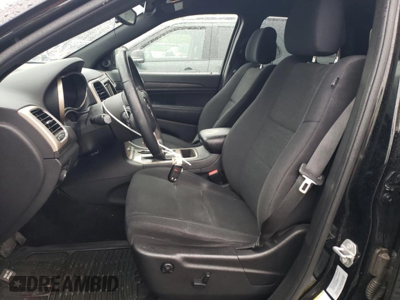 2017 Jeep Grand Cherokee Laredo with VIN 1C4RJFAG2HC754157, listed as a Copart auction lot 55650095 with 60,767 mi miles and Salvage title. Bid and sale history available at DreamBid. Image 7.