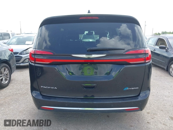 2023 Chrysler Pacifica Hybrid Touring L with VIN 2C4RC1L75PR611901, listed as a IAAI auction lot 42626500 with 44,156 mi miles and . Bid and sale history available at DreamBid. Image 16.