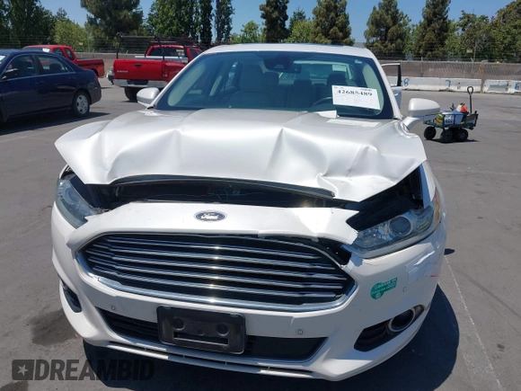 2016 Ford Fusion Titanium z VIN 3FA6P0SU1GR116118, wystawiony jako IAAI lot #42685489 z przebiegiem 138 690 mil mil oraz . Historia ofert i sprzedaży dostępna na DreamBid. Obrazek 12.