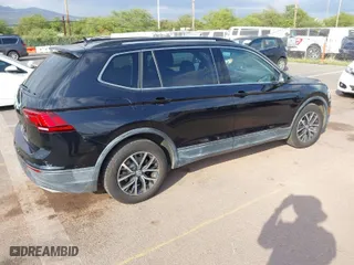 2019 Volkswagen Tiguan SE with VIN 3VV3B7AXXKM012766, listed as a IAAI auction lot 41571347 with 56,594 mi miles. Bid and sale history available at carsss.com. Image 4.