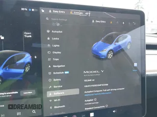 2021 Tesla Model Y Standard Range with VIN 5YJYGDED3MF103499, listed as a IAAI auction lot 41632064 with 132,846 mi miles and . Bid and sale history available at DreamBid. Image 7.