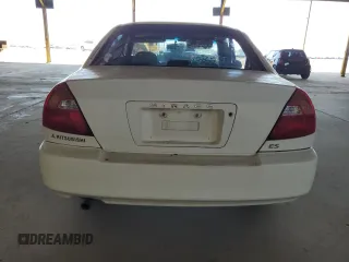 2001 Mitsubishi Mirage ES z VIN JA3AY26CX1U013535, wystawiony jako Copart lot #57664885 z przebiegiem 159 095 mil mil oraz Szkoda całkowita • Salvage title. Historia ofert i sprzedaży dostępna na DreamBid. Obrazek 6.