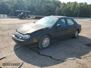 1998 Ford Taurus LX with VIN 1FAFP52U9WA174855, listed as a Copart auction lot 66728184 with 104,796 mi miles and Salvage Title. Bid and sale history available at carsss.com. Image 1.