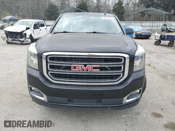 2015 GMC Yukon SLT with VIN 1GKS1BKC1FR615562, listed as a Copart auction lot 46374135 with 141,207 mi miles and Salvage Title. Bid and sale history available at carsss.com. Image 5.