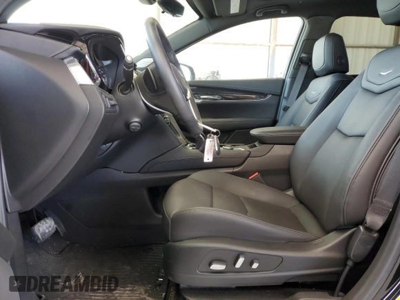 2021 Cadillac XT5 FWD Premium Luxury с VIN 1GYKNCRSXMZ155473, выставлен на аукционе Copart как лот 59883874 с пробегом 2 038 миль миль и Списание • Salvage title. История ставок и продаж доступна на DreamBid. Изображение 7.