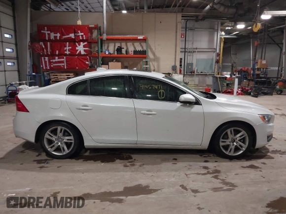 2015 Volvo S60 T5 Drive-E Premier z VIN YV126MFB4F1311693, wystawiony jako IAAI lot #41457471 z przebiegiem 146 042 mil mil oraz . Historia ofert i sprzedaży dostępna na DreamBid. Obrazek 6.