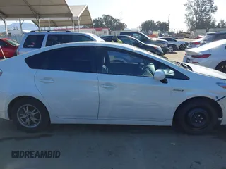 2011 Toyota Prius I with VIN JTDKN3DU3B0318495, listed as a IAAI auction lot 41945115 with 240,553 mi miles and . Bid and sale history available at DreamBid. Image 14.