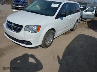 2016 Dodge Grand Caravan American Value Pkg with VIN 2C4RDGBG8GR284928, listed as a IAAI auction lot 41742483 with 96,909 mi miles. Bid and sale history available at carsss.com. Image 17.