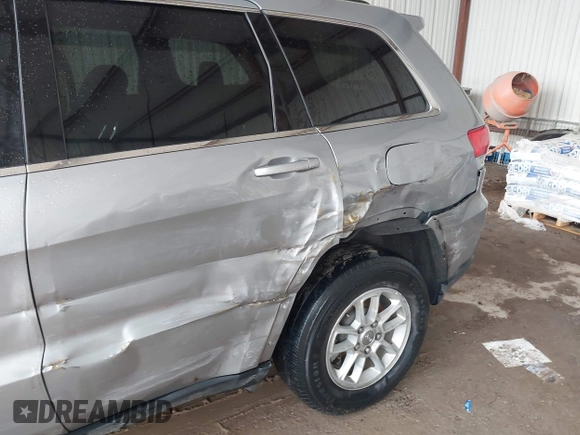 2018 Jeep Grand Cherokee Laredo E with VIN 1C4RJEAG1JC275356, listed as a IAAI auction lot 42150422 with 69,720 mi miles and . Bid and sale history available at DreamBid. Image 6.