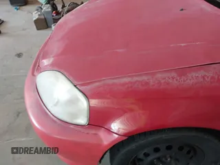 2000 Honda Civic DX z VIN 1HGEJ6227YL097214, wystawiony jako IAAI lot #41587618 z przebiegiem Nie podano mil oraz . Historia ofert i sprzedaży dostępna na DreamBid. Obrazek 10.