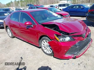 2019 Toyota Camry LE z VIN 4T1B11HK9KU708126, wystawiony jako IAAI lot #41853377 z przebiegiem 50 506 mil mil oraz . Historia ofert i sprzedaży dostępna na DreamBid. Obrazek 1.