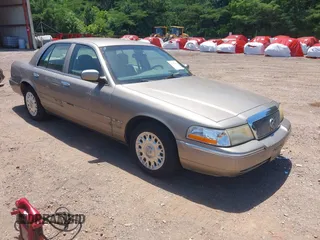 2004 Mercury Grand Marquis GS z VIN 2MEFM74W54X602551, wystawiony jako IAAI lot #42318184 z przebiegiem 53 997 mil mil oraz . Historia ofert i sprzedaży dostępna na DreamBid. Obrazek 1.
