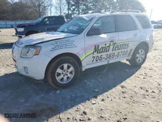 2010 Mercury Mariner with VIN 4M2CN8B70AKJ20663, listed as a Copart auction lot 87908285 with 170,104 mi miles and Salvage Title. Bid and sale history available at carsss.com. Image 1.