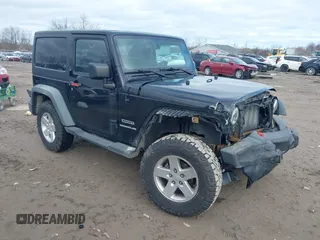 2011 Jeep Wrangler Sport with VIN 1J4AA2D1XBL634783, listed as a IAAI auction lot 41928702 with 154,379 mi miles and . Bid and sale history available at carsss.com. Image 1.