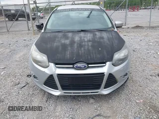2012 Ford Focus SE z VIN 1FAHP3K28CL369762, wystawiony jako IAAI lot #42095476 z przebiegiem 150 584 mil mil oraz . Historia ofert i sprzedaży dostępna na DreamBid. Obrazek 6.