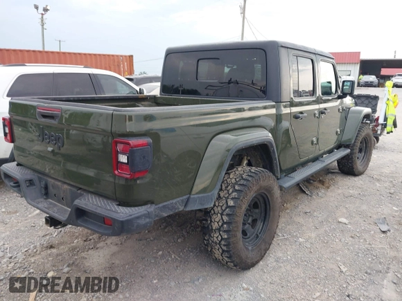 2022 Jeep Gladiator Texas Trail z VIN 1C6HJTAG1NL105124, wystawiony jako IAAI lot #42601707 z przebiegiem 52 064 mil mil oraz . Historia ofert i sprzedaży dostępna na DreamBid. Obrazek 4.