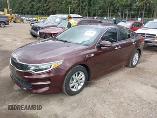 2016 Kia Optima LX with VIN 5XXGT4L39GG088686, listed as a IAAI auction lot 42531803 with 66,521 mi miles and . Bid and sale history available at DreamBid. Image 2.