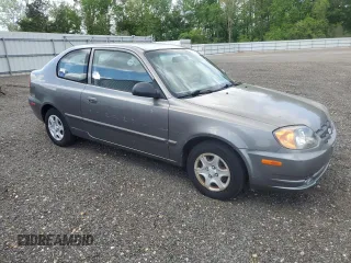 2005 Hyundai Accent GLS with VIN KMHCG35C15U342811, listed as a Copart auction lot 54855705 with 39,299 mi miles and Clean Title. Bid and sale history available at carsss.com. Image 4.