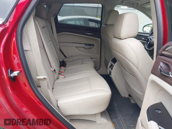 2016 Cadillac SRX Performance Collection z VIN 3GYFNCE39GS504754, wystawiony jako IAAI lot #42290812 z przebiegiem 29 866 mil mil oraz . Historia ofert i sprzedaży dostępna na DreamBid. Obrazek 8.