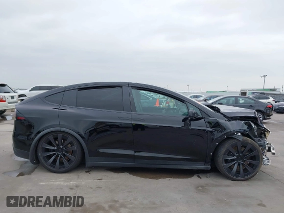 2023 Tesla Model X Plaid with VIN 7SAXCBE63PF376320, listed as a IAAI auction lot 40954738 with Not Provided miles and . Bid and sale history available at DreamBid. Image 14.