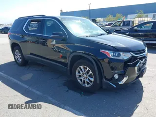 2021 Chevrolet Traverse LT Cloth with VIN 1GNERGKW9MJ162089, listed as a IAAI auction lot 41944248 with 99,586 mi miles. Bid and sale history available at carsss.com. Image 1.