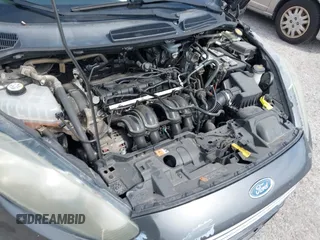 2016 Ford Fiesta SE with VIN 3FADP4EJ4GM129006, listed as a IAAI auction lot 42085892 with 146,044 mi miles. Bid and sale history available at carsss.com. Image 6.