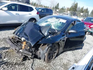 2021 Tesla Model S Long Range Plus z VIN 5YJSA1E24MF426299, wystawiony jako IAAI lot #41673498 z przebiegiem 102 035 mil mil oraz . Historia ofert i sprzedaży dostępna na DreamBid. Obrazek 14.