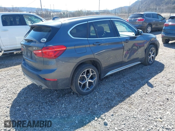 2017 BMW X1 sDrive28i with VIN WBXHU7C37H5H32815, listed as a IAAI auction lot 41837113 with 67,097 mi miles. Bid and sale history available at carsss.com. Image 4.