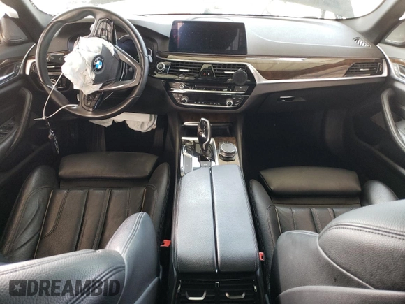 2018 BMW 5 Series 530i z VIN WBAJA5C50JG898675, wystawiony jako Copart lot #51188145 z przebiegiem Nie podano mil oraz Szkody całkowita. Historia ofert i sprzedaży dostępna na DreamBid. Obrazek 8.