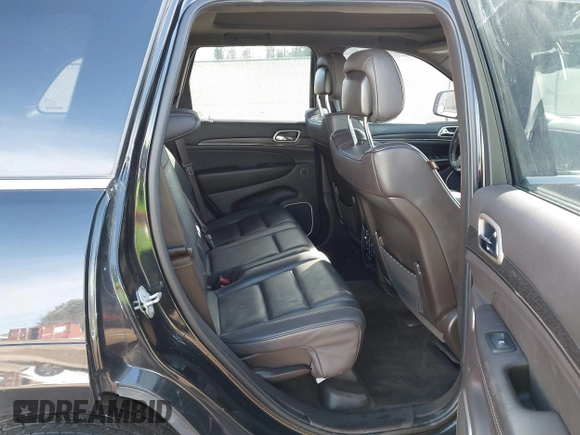 2015 Jeep Grand Cherokee Summit with VIN 1C4RJFJMXFC878812, listed as a IAAI auction lot 41637279 with 149,488 mi miles. Bid and sale history available at carsss.com. Image 8.