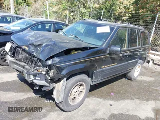 1997 Jeep Grand Cherokee Limited with VIN 1J4GZ78Y1VC658515, listed as a IAAI auction lot 41897266 with 164,033 mi miles and . Bid and sale history available at DreamBid. Image 2.