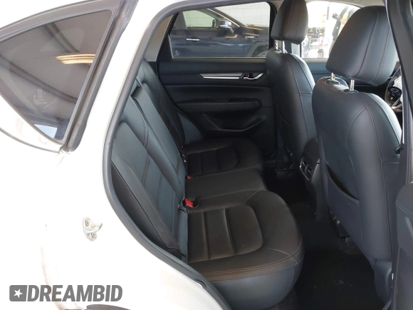 2020 Mazda CX-5 Grand Touring with VIN JM3KFBDM2L0863944, listed as a IAAI auction lot 42150805 with 63,932 mi miles and . Bid and sale history available at DreamBid. Image 8.