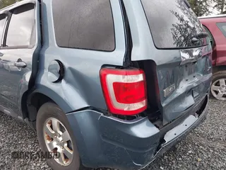 2011 Ford Escape Limited with VIN 1FMCU9EG1BKB25815, listed as a IAAI auction lot 41937422 with 166,207 mi miles. Bid and sale history available at carsss.com. Image 6.
