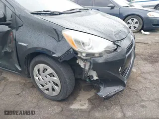 2016 Toyota Prius c One with VIN JTDKDTB36G1589422, listed as a IAAI auction lot 41883878 with 121,791 mi miles. Bid and sale history available at carsss.com. Image 6.