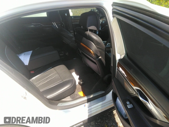 2017 BMW 7 Series 750i with VIN WBA7F0C35HGM21649, listed as a IAAI auction lot 37362691 with 10,000 mi miles and . Bid and sale history available at DreamBid. Image 8.