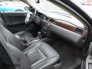 2014 Chevrolet Impala Limited LTZ with VIN 2G1WC5E36E1153939, listed as a IAAI auction lot 41776739 with NaN miles. Bid and sale history available at carsss.com. Image 5.