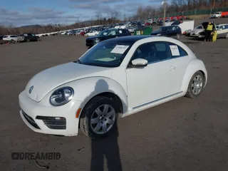 2019 Volkswagen Beetle SE with VIN 3VWJD7AT6KM713525, listed as a IAAI auction lot 41508195 with 73,360 mi miles. Bid and sale history available at carsss.com. Image 2.